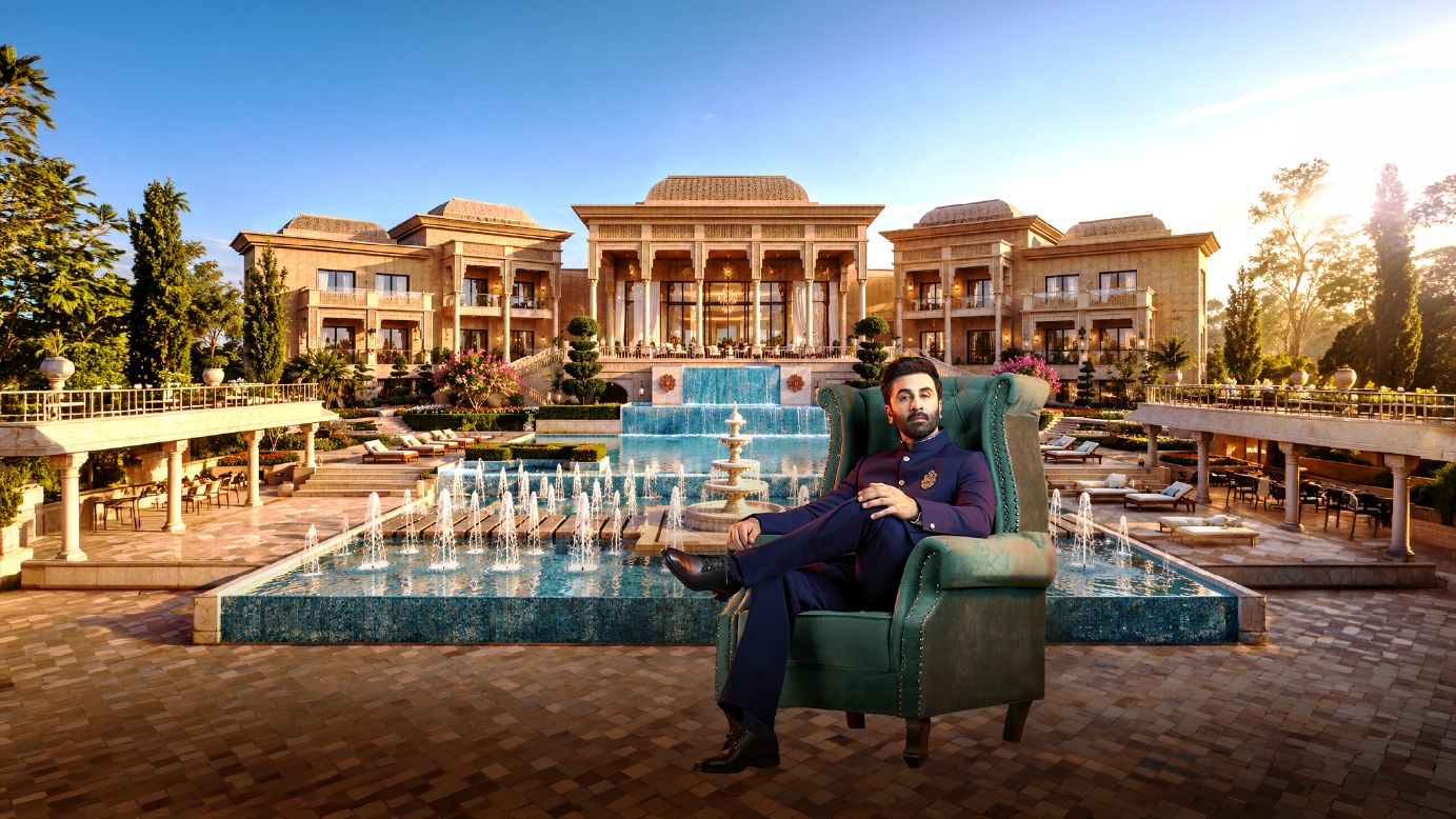 The Sarayu Royale palace-inspired project setting with gardens and water features